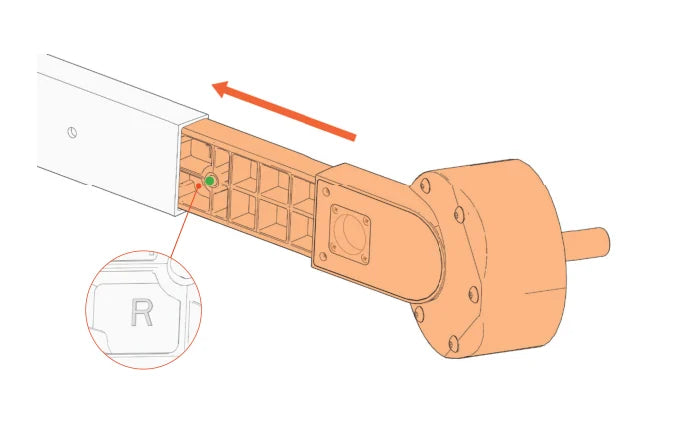 De rechter E-Wheelarm wordt in de framearm geschoven, het veerbolletje is gemarkeerd.