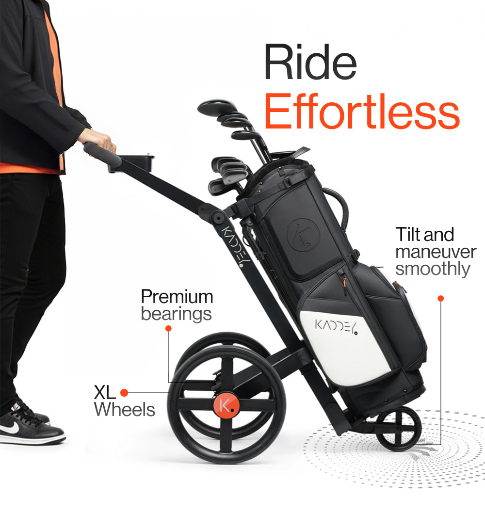 Kaddey Switch being pushed by a male with features explained why it walk effortless like: xl wheels, premium bearings and tilt and maneuver smoothly.